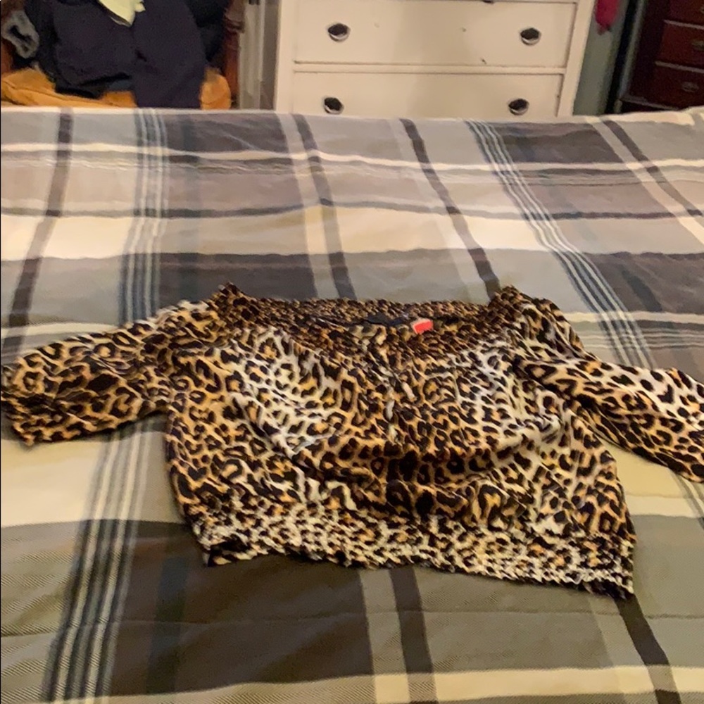 Gorgeous leopard print blouse. Never worn.